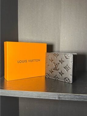 Louis Vuitton Men’s Monogram Embossed Wallet - Metallic Black